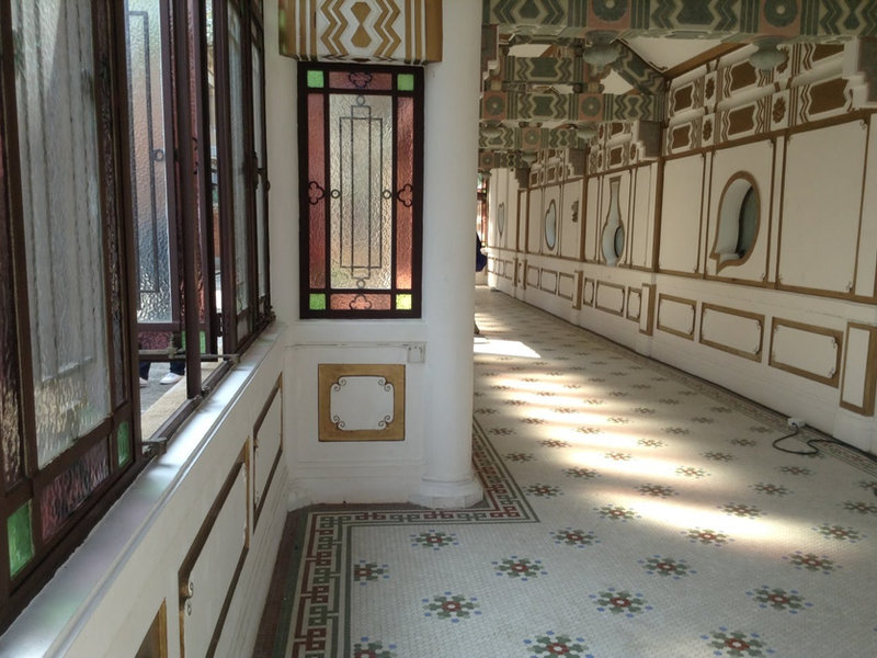 King Yin Lei interior corridor with stained glass and heritage tiles